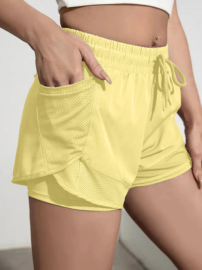 Women's Elastic Sports Shorts With Pockets